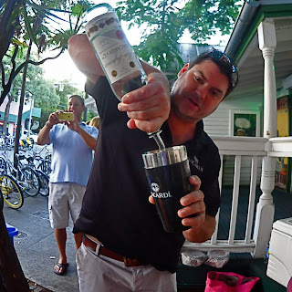 Barman making another mojito image