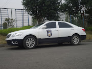 As I was sitting there a police car pulled up and of course I had to get a . (chinese police car)