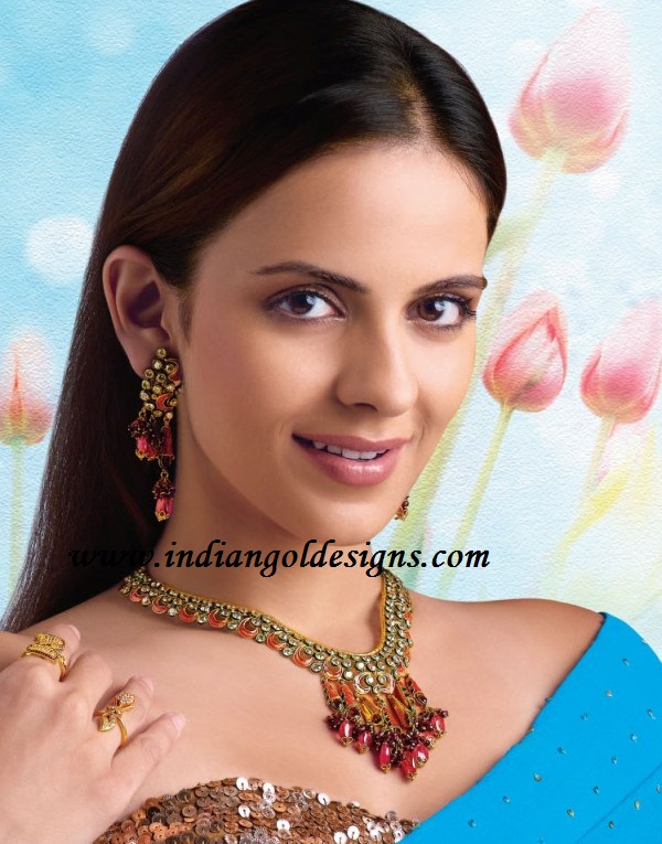Gold and Diamond jewellery designs designer gold necklace set from
