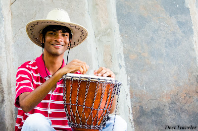 music mango tree restaurant hampi man in hat with drum