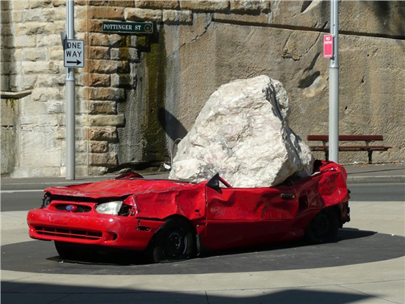 Ford Festiva Crushed Art Car - Still life with stone and car