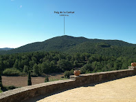 La vessant nord del Puig de la Caritat des de Sant Feliuet de Terrassola La vessant nord del Puig de la Caritat des de Sant Feliuet de Terrassola