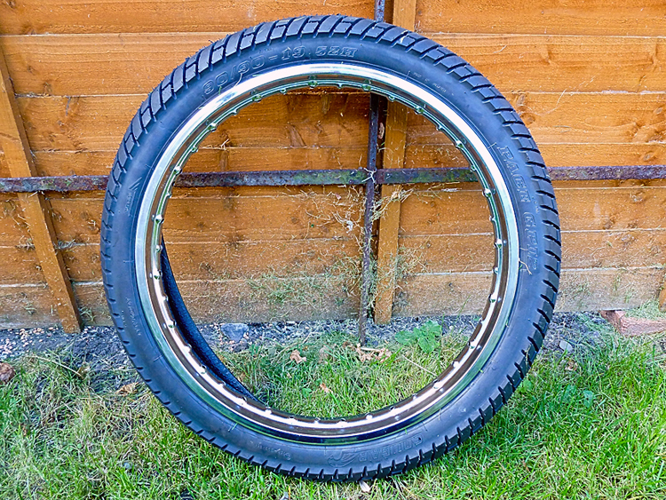 wich Moped tire and rim = 24"doubletrack and hookwork 2.5 ? Endless