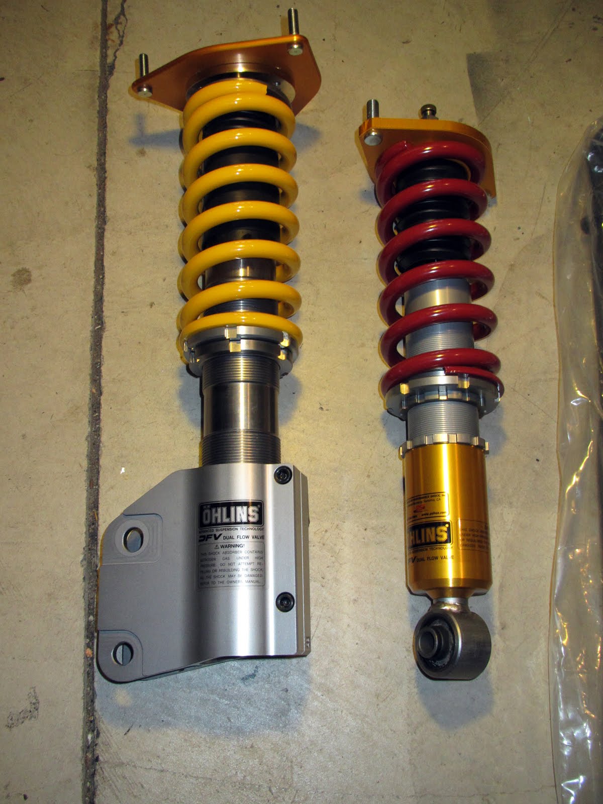 Lowering OHLINS T&R coilovers in the rear Subaru Impreza WRX STI