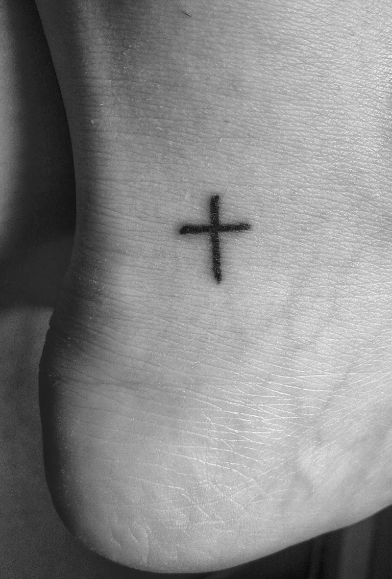 Small Cross Tattoo On Foot