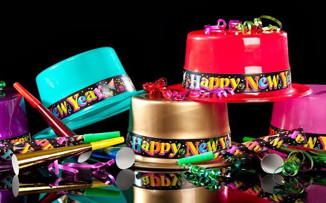 New Years' Eve Party Hats On Black Background