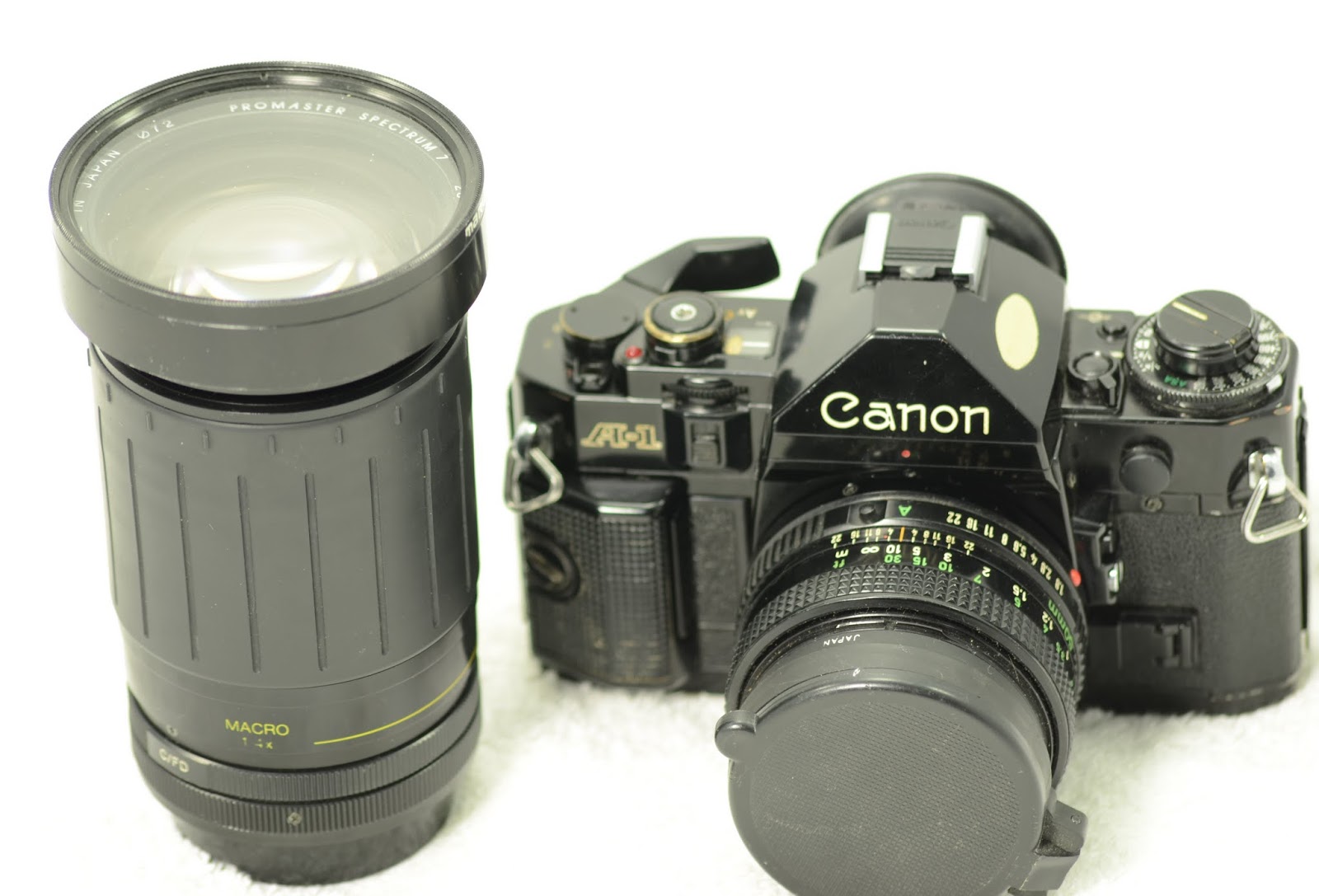 Vintage Camera House Canon A1 kit with 2 lenses