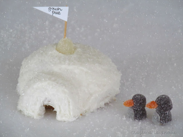 gumdrop penguins and a cake and doughnut igloo