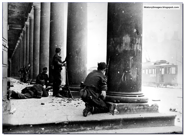 Warsaw Uprising 1944 German soldiers hiding behind pillarse Grand Opera Warsaw  crush  uprising