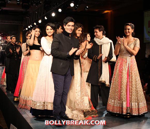 Manish Malhotra (front, left) escorts his celebrity muses onto the ramp - (29) - Priyanka, Dia, Parineeti & other Celebs catwalk for a cause