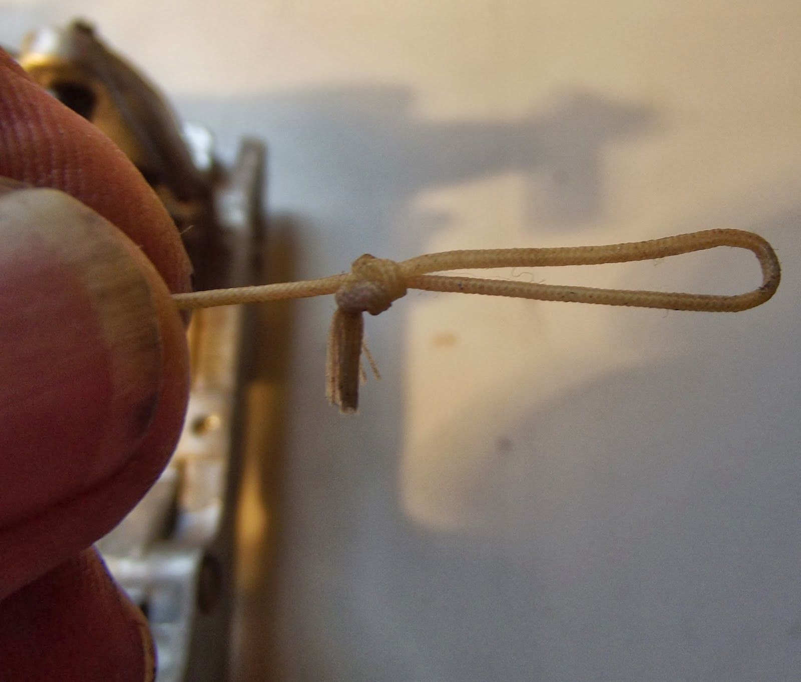 oz.Typewriter Reattaching the Drawband to the Mainspring on a Portable