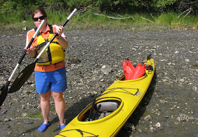 While I schlepped the kayak to the water's edge, Britta waited at the bottom of the 7 meter slope with the kayaking paraphernalia 