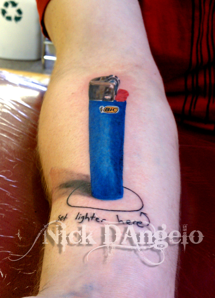 3D BLUE LIGHTER WITH INK TATTOO ON HAND