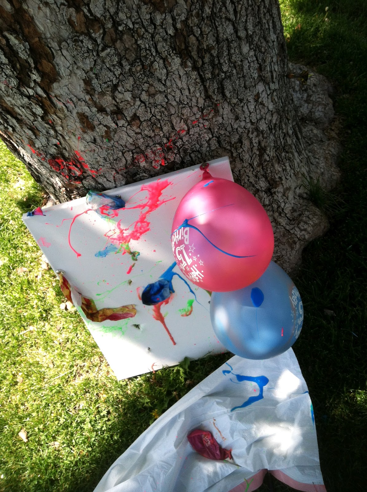 ruhbekuh Throwing darts at balloons filled with paint at Liberty