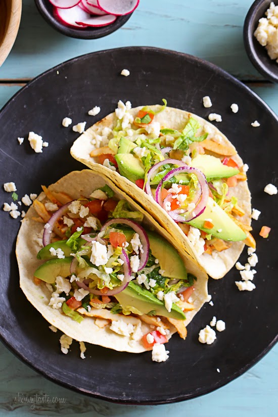 Grilled Chicken Tacos with Lettuce Slaw, Avocado and Cotija