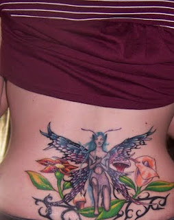 Lower back Fairy Angel Tattoo with Flowers and Tribal Design