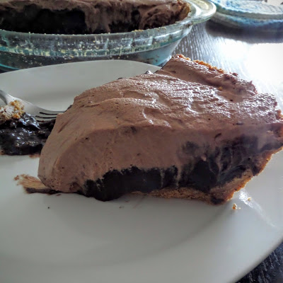 Double Chocolate Pie:  Dark chocolate pudding in a Kona coffee graham cracker crust topped with chocolate whipped cream.  A pie for chocolate lovers.