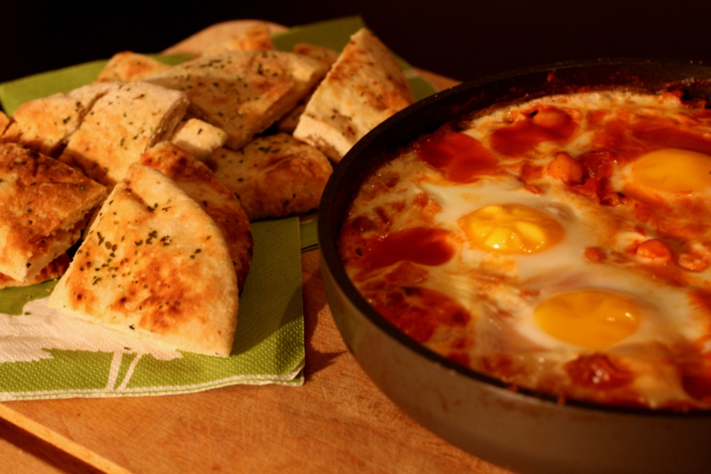 Step One Poached Eggs in Tomato Sauce with Chickpeas and Feta