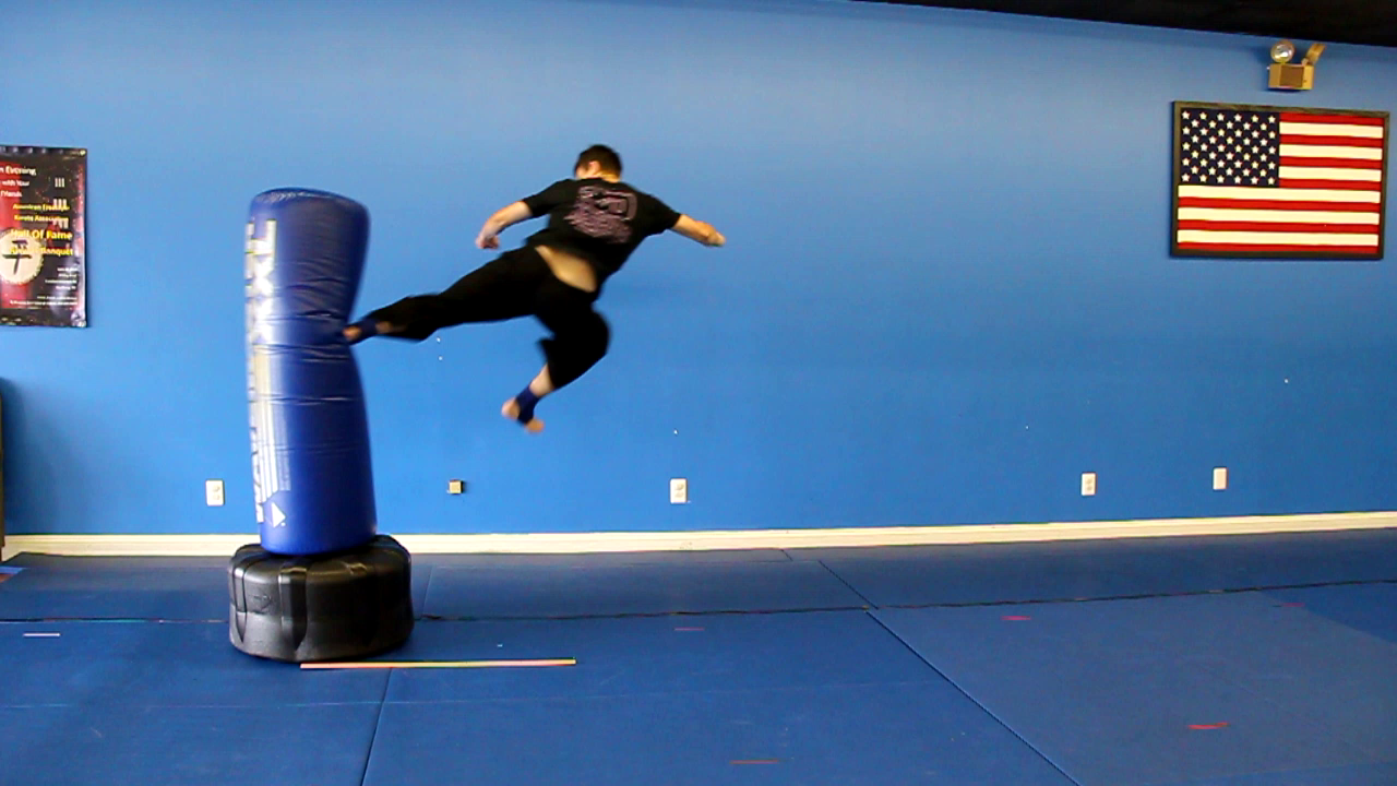 Physics of a Flying Side Kick Making Sport of Physics