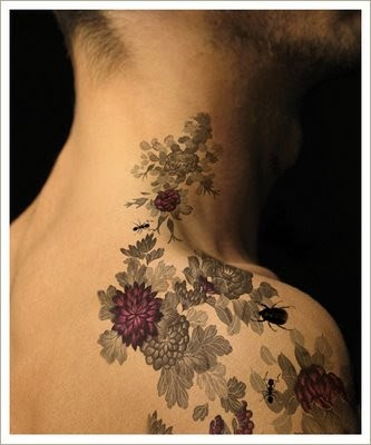 flowers tattoo designs. neck tattoo ideas. Flowers