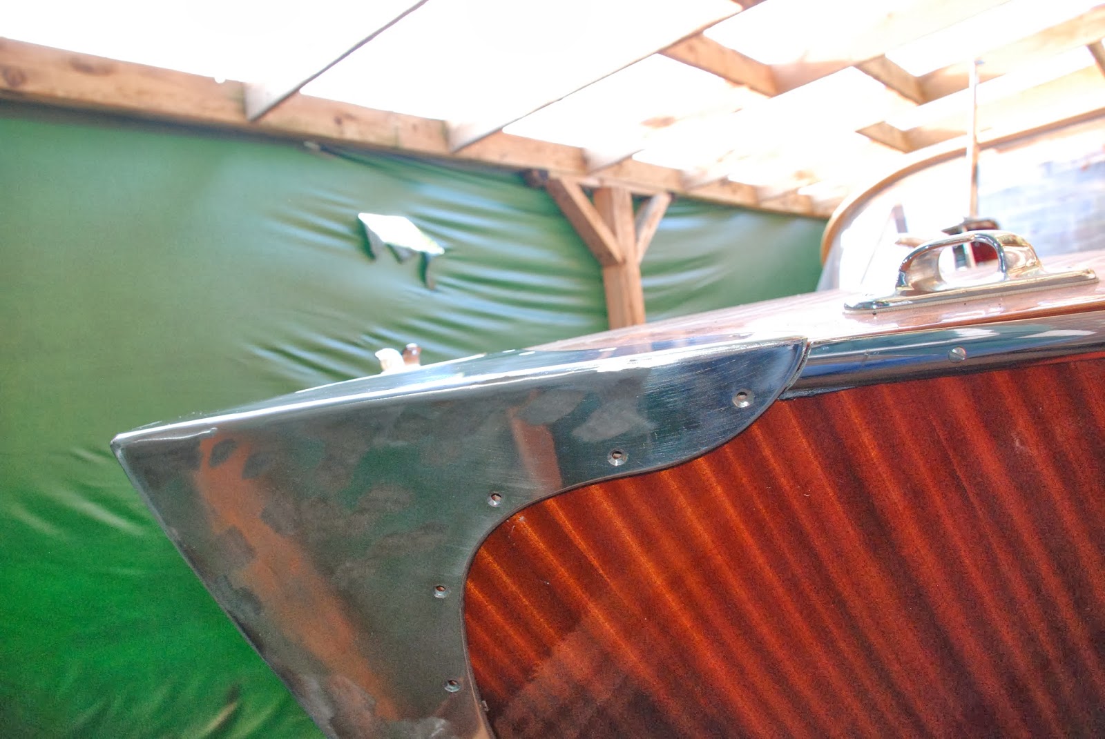 my wooden speed boat build Stainless steel trim and Bow plate