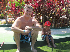 Alexandre and Dad playing Mini Putt in Mexico