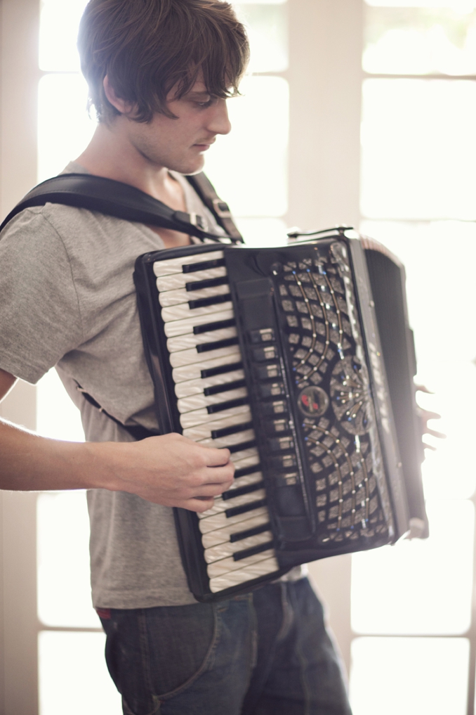 Accordion musician Dave Thomas photographed by STUDIO 1208