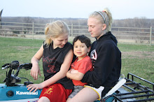 Mateo on 4 wheeler with his sisters