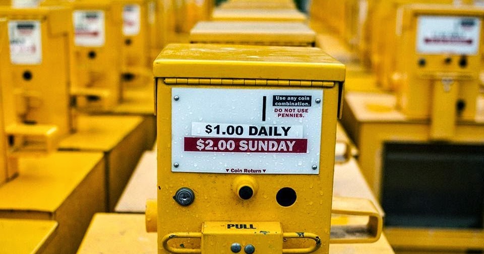 Newspapering Coinoperated Newspaper Vending Racks Once a Common Sight