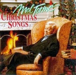 "The Christmas Song" (aka "Chestnuts Roasting On an Open Fire") by Mel Torme (aka The Velvet Fog), originally recorded by Nat King Cole