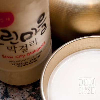 A cup of Slow City Makgeolli from Baesangmyun Brewery in Chicago, United States.