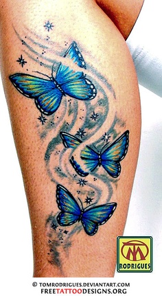 Tribal blue color butterfly tattoo on leg 