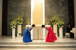 Bowing in front of the alter