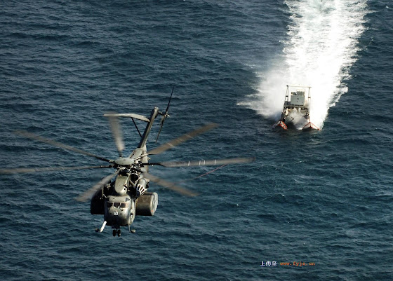 An MH-53E Sea Dragon helicopter performs mine countermeasure training using the MK-105 sled in the Persian Gulf on Nov. 12, 2007. (Lt. Cmdr. John L. Kline | U.S. Navy) MH-53E Sea Dragon