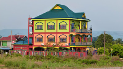 colorful house after the border near the city