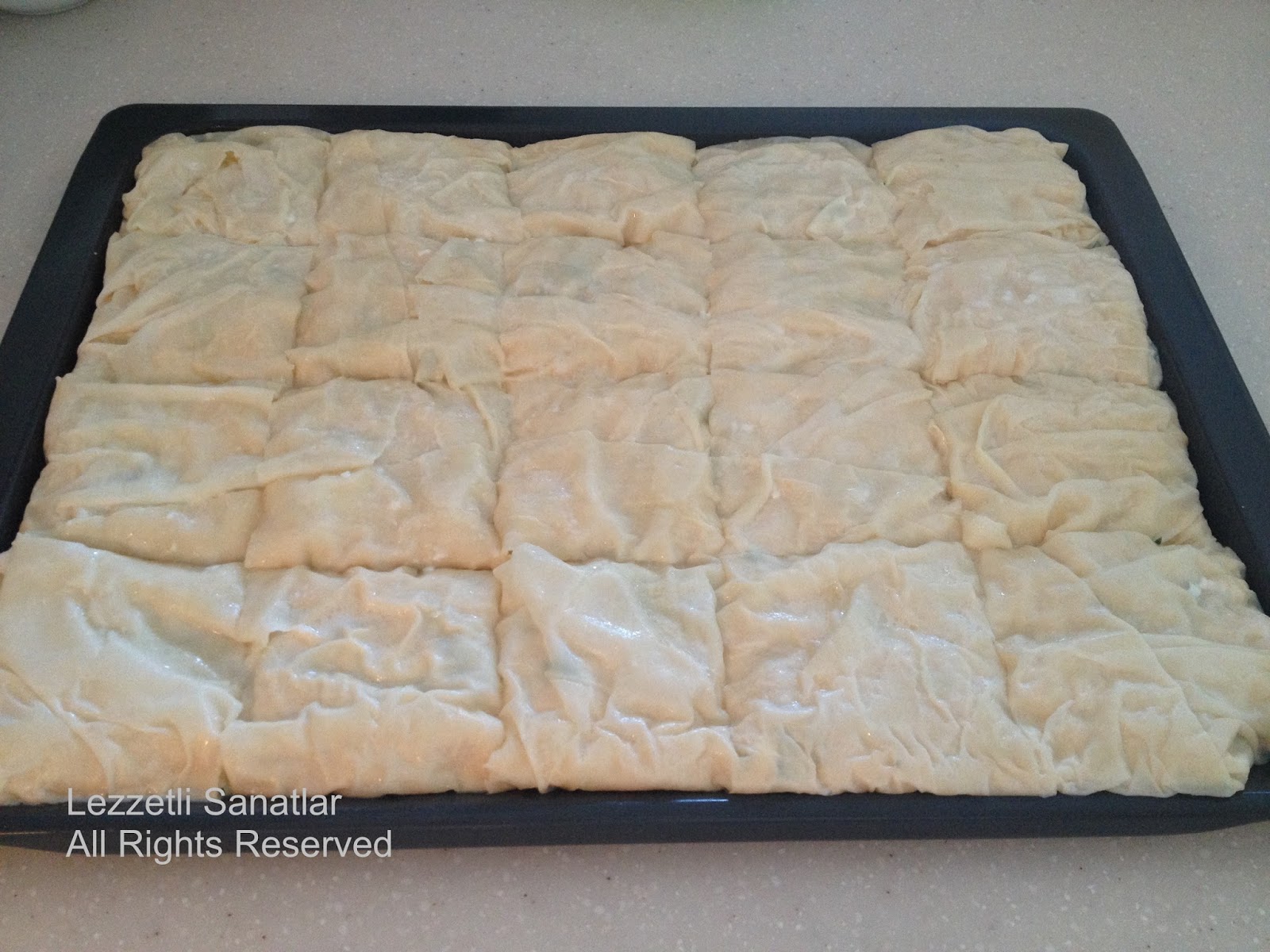 Lezzetli Sanatlar KOLAY TEPSİ BÖREĞİ