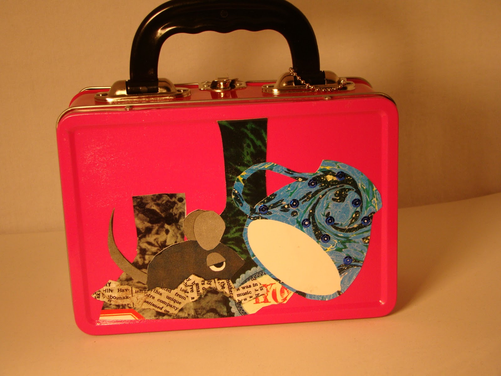 Decoupage Creations by Emily Little lunch box with featured illustrations from Alexander and