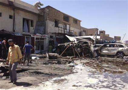 Car bombs ripped through busy streets and markets in Iraq on Monday, killing at least 60 people