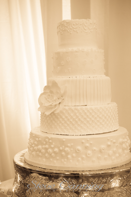Silver cake stand is part of the inventory at Elizabeth Bailey Weddings Silver cake stand is part of the inventory at Elizabeth Bailey Weddings