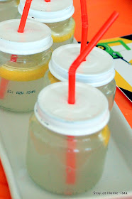 close up of jar sippers full of lemonade