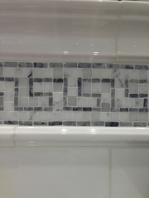 An Urban Cottage Tile In The Tub Shower Surround I Continued That Chair Rail With A Greek Key Mosaic