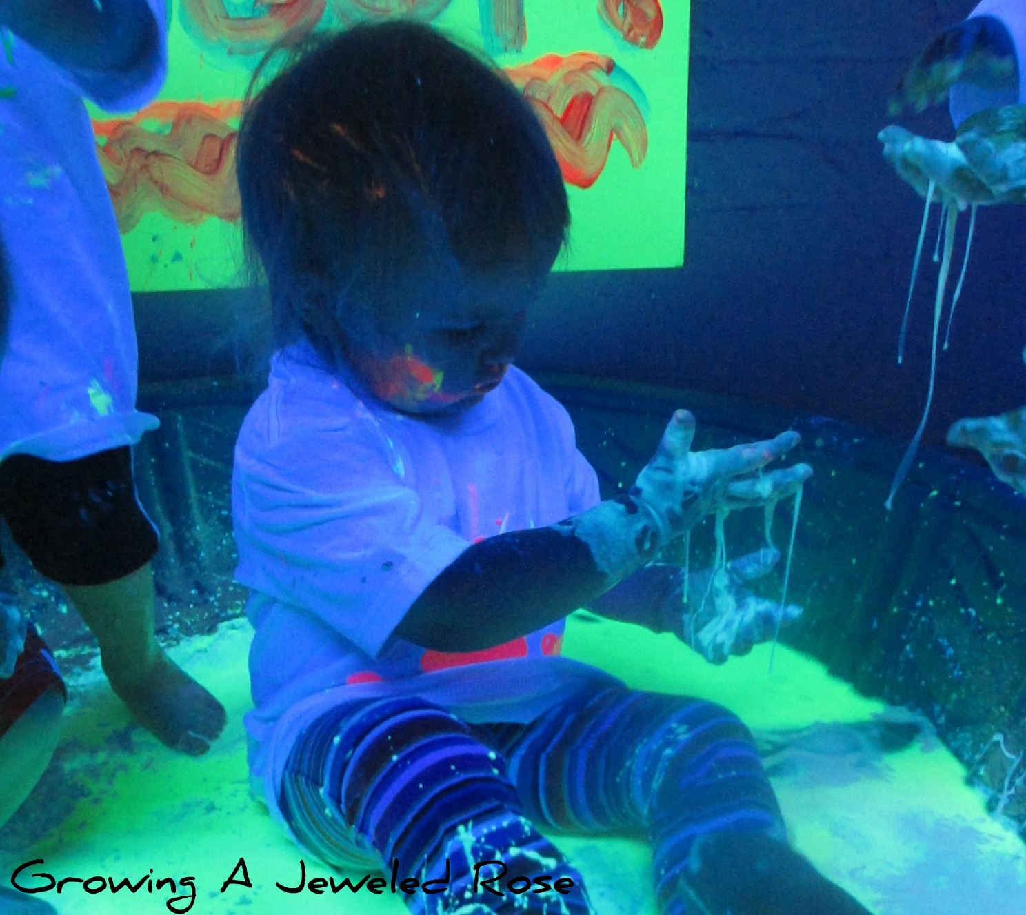 Black Light Themed Group Sensory Play Growing A Jeweled Rose