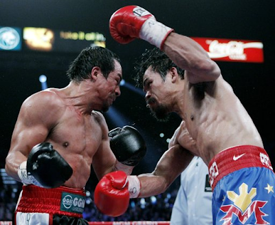 Manny "Pacman" Pacquiao vs Juan Manuel "Dinamita" Marquez III Post
fight Assessment: Is Marquez robbed for the third time?