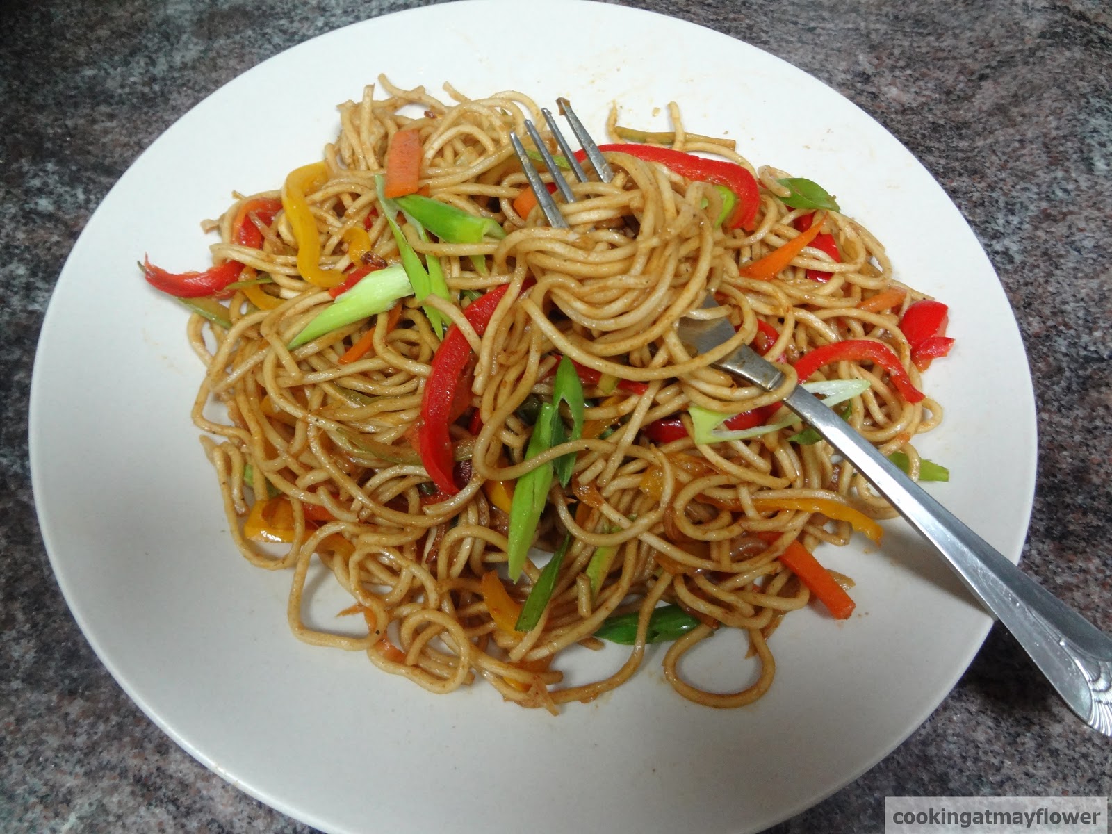 Cooking at Mayflower Vegetable Hakka noodles