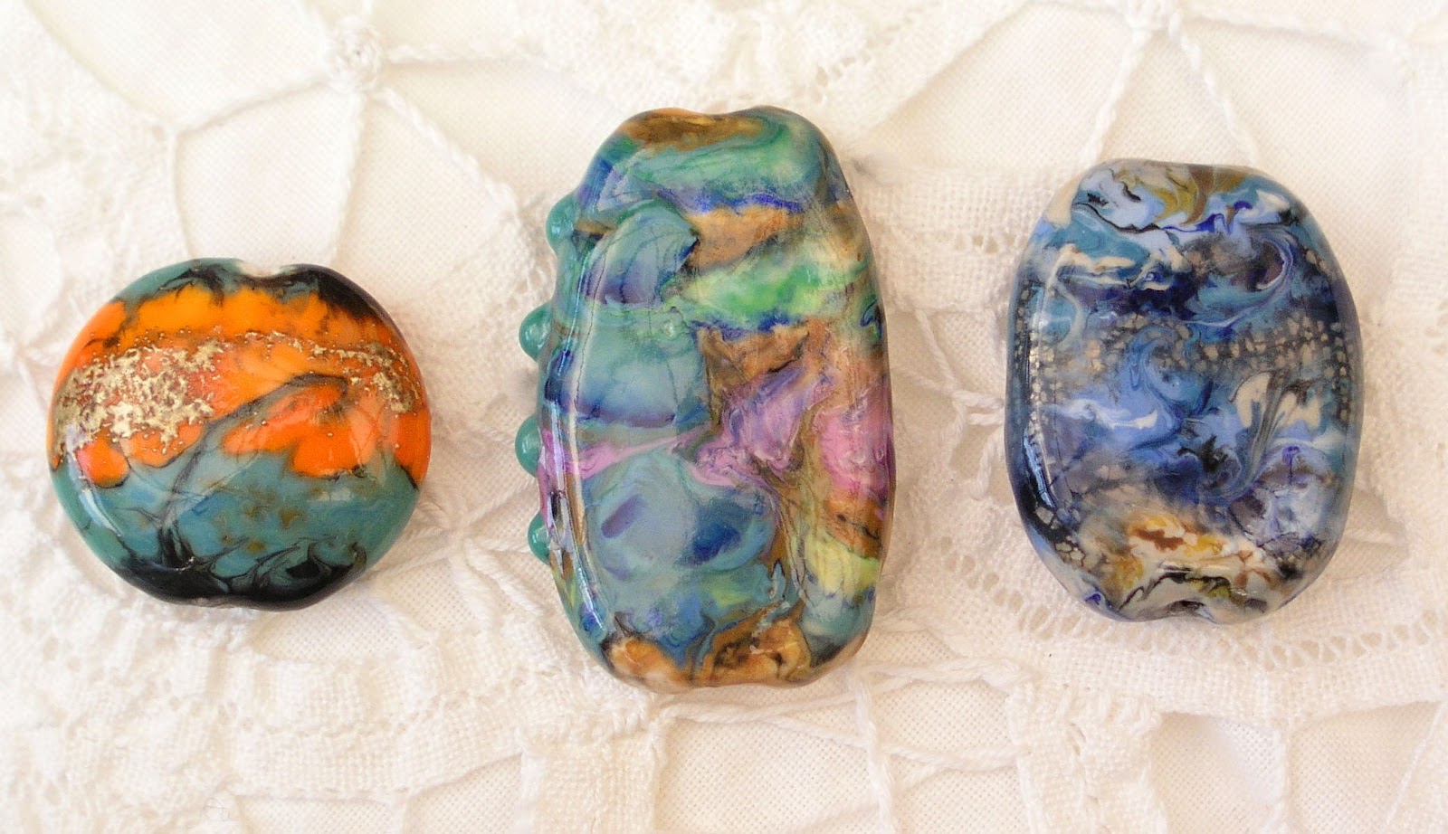 Caroline Fung A few of my faux lampwork polymer clay beads