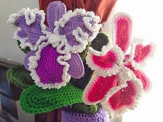 http://www.ravelry.com/patterns/library/cattleya-orchid-crochet-flower