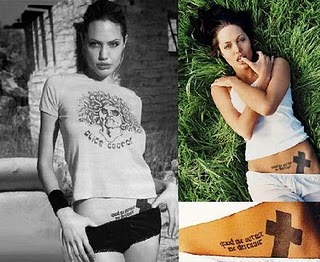 Angelina Jolie large black cross tattoo