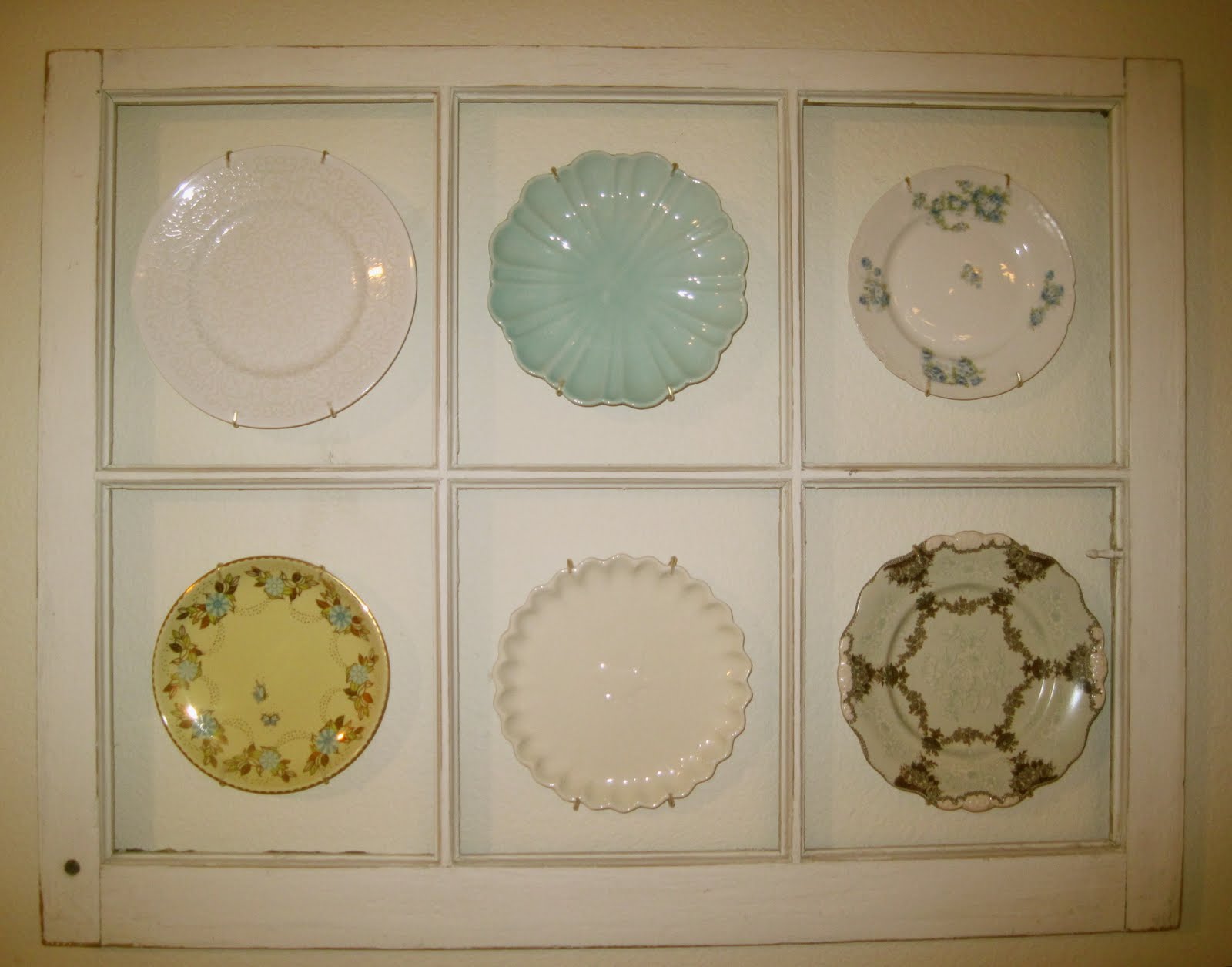 A Chic Twist Decorating with plates and windows