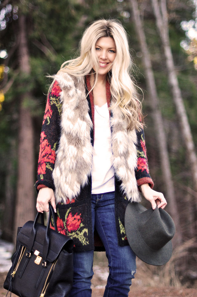 woodsy outfit in the woods, faux fur vest