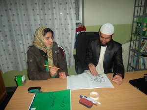 Rasool and Her Colleague Waseema Rahyab discussing their following day lesson plan